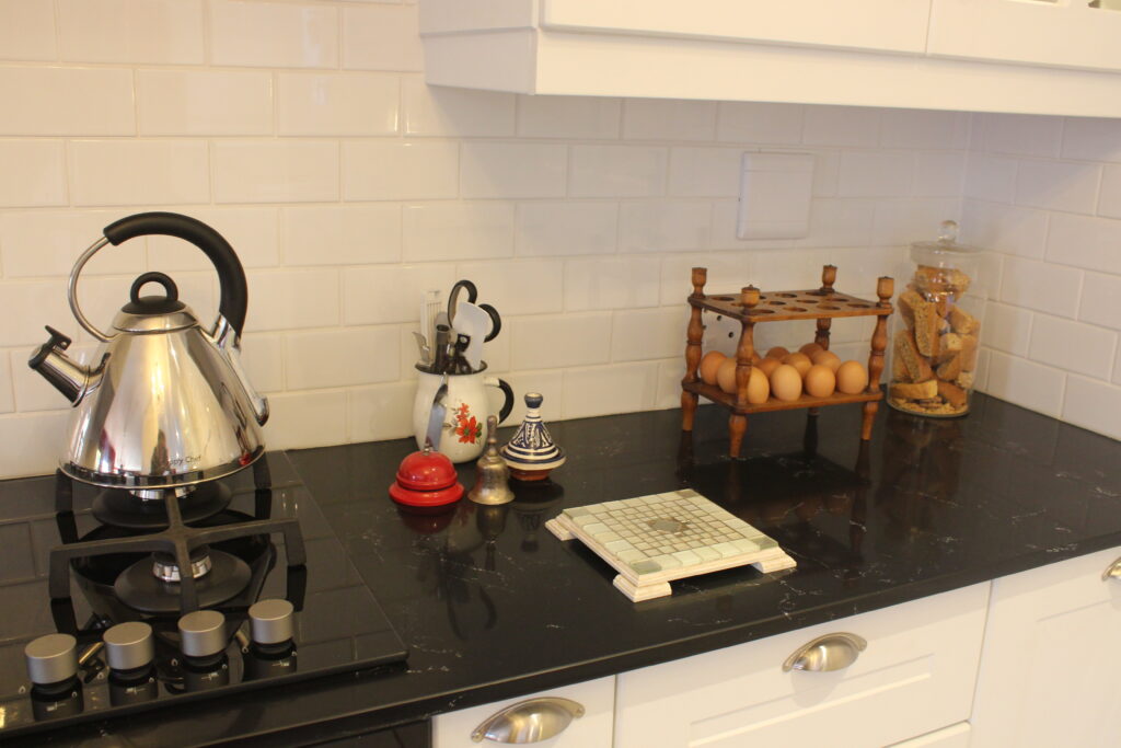 This black quartz has fine white veins in it, it went so well with the overall look of this kitchen.