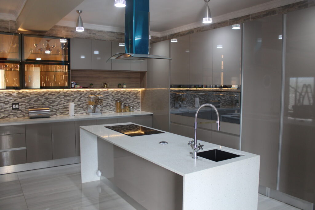 We did this lovely kitchen with Crystal that is white quartz that looks like it has mirror pieces in it.